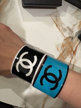 CHANEL blue and Black Logo Cuff Bracelets